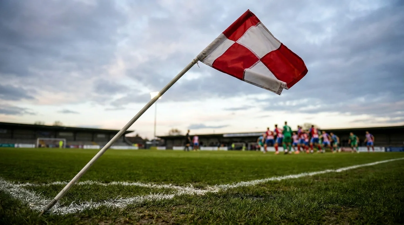 Football set-piece routine being delivered from corner flag area